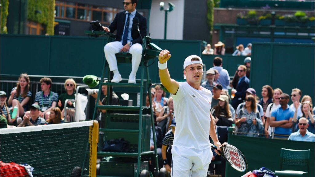 footage of arthur fery and felix gill playing doubles at 2022 wimbledon second round