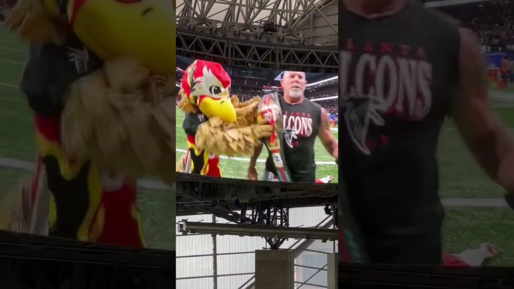 goldbergs epic moment spears fan in tom brady jersey at atlanta falcons game wwe goldberg