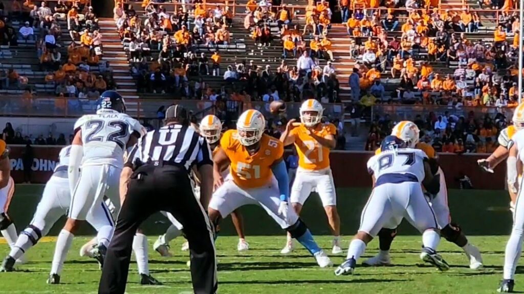 navy shuler gives the football to hunter barnes tennessee volunteers vs uconn huskies