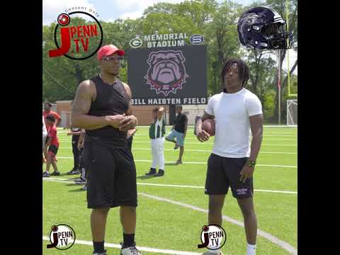 d1 prospect ronald moore jr gives back to his community by attending youth football media day shs