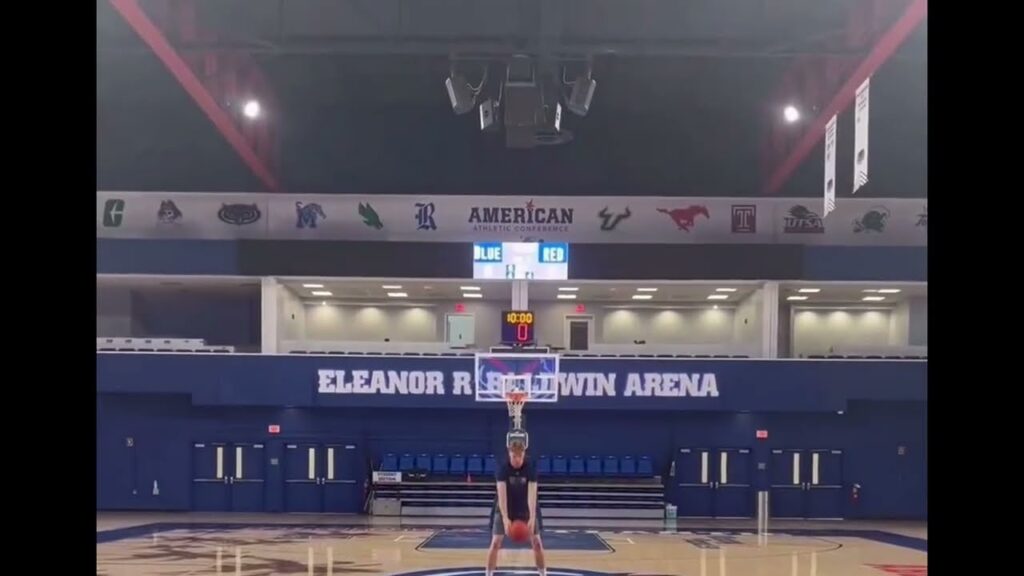 florida atlantic mens basketball center mantas kocanas tosses underhanded half court shot all net