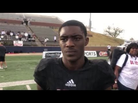 holland halls nunu campbell talks with barry lewis after a win in the 3a state title game