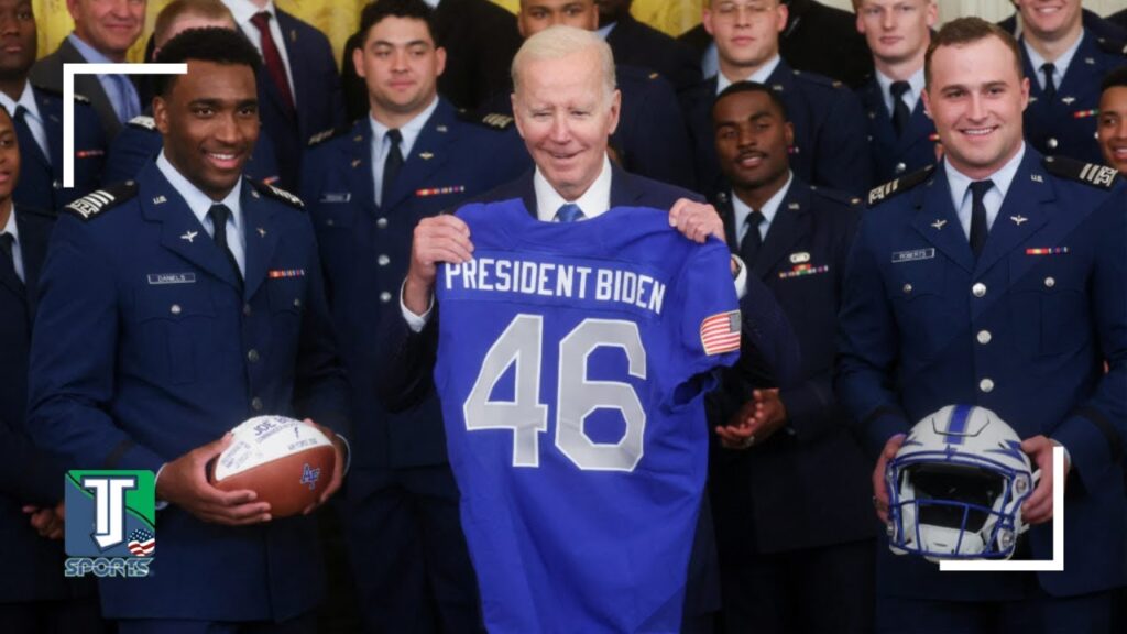 president joe biden presents the commander in chiefs trophy to the air force falcons