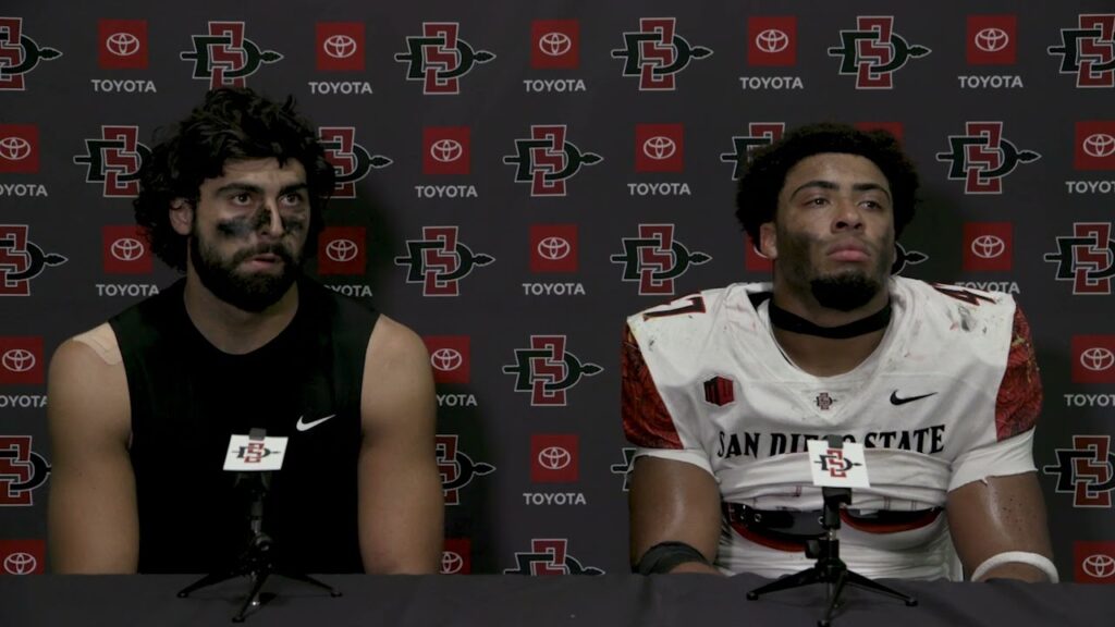 sdsu football players jude wolfe trey white post game after cmu