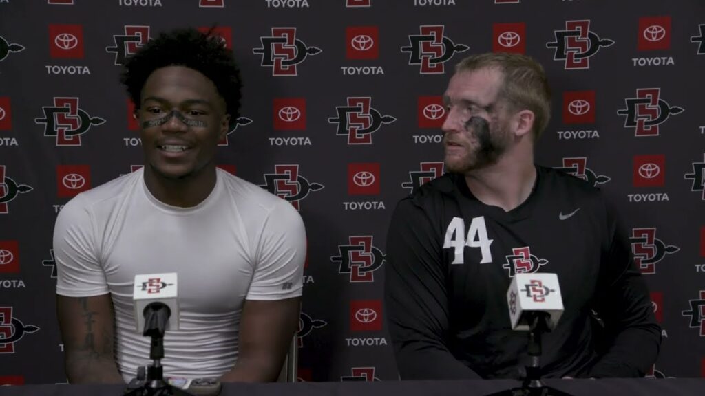 sdsu football players kyle moretti jordan napier post game after wyoming 1