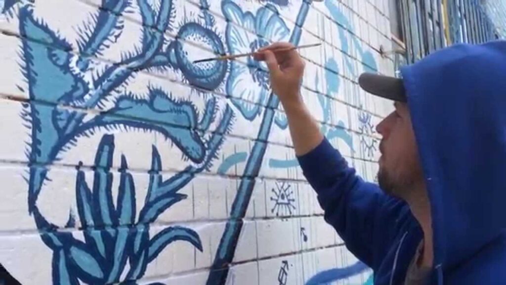 stare into the poppy river a mural by josh hunter