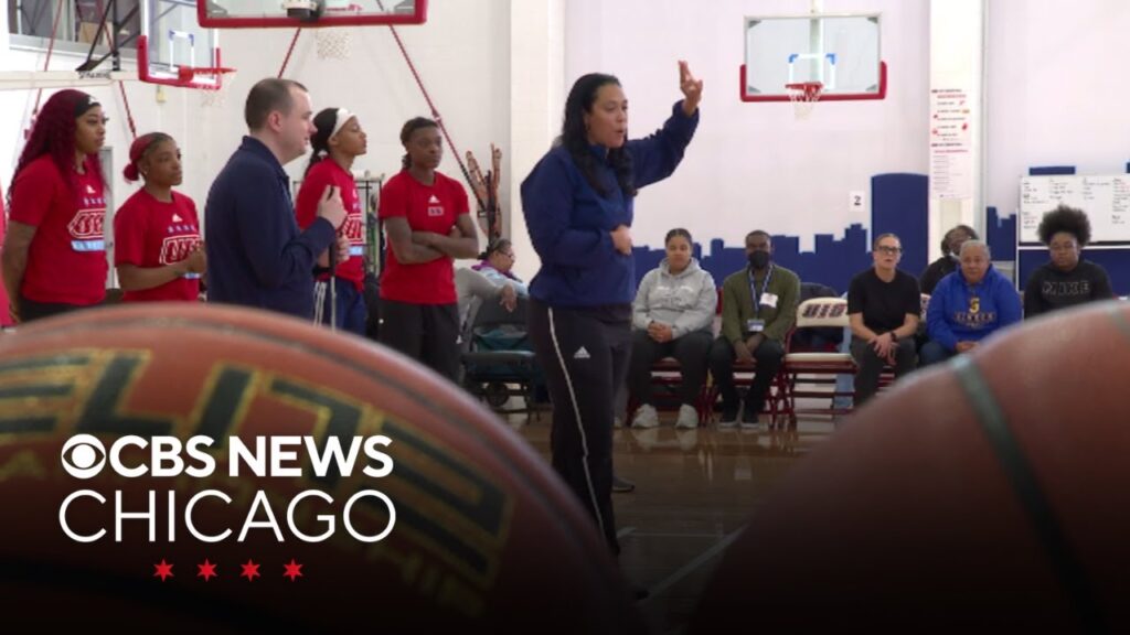 university of illinois chicago basketball players teach those with disabilities basics of the game